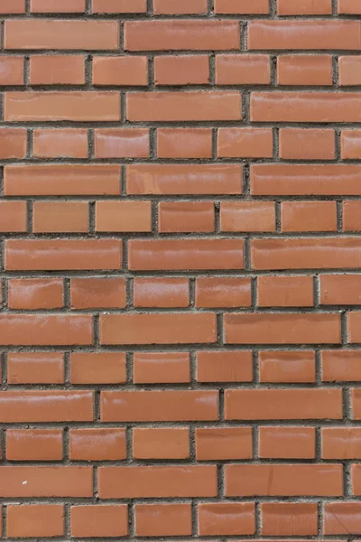 Kırmızı ile siyah dikişleri taş tuğla duvar desen sorunsuz doku arka plan dikey yakın çekim