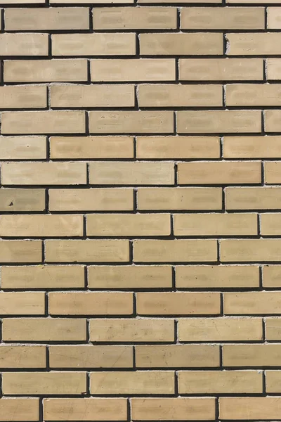 Gele stenen bakstenen muur patroon textuur achtergrond — Stockfoto