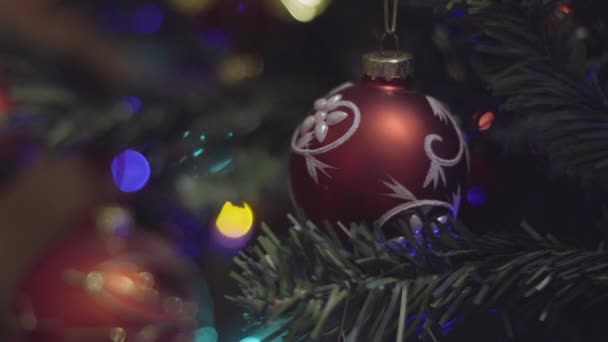 Christmas and New Year Decoration. Blurred Bokeh Holiday Background. Blinking Garland. Christmas Tree Lights Twinkling. — Stock Video