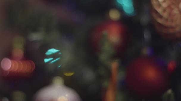 Jul och nyår semester dekoration. Abstrakt suddig Bokeh Holiday bakgrund. Blinkande Garland. Julgransljus tindrande. — Stockvideo