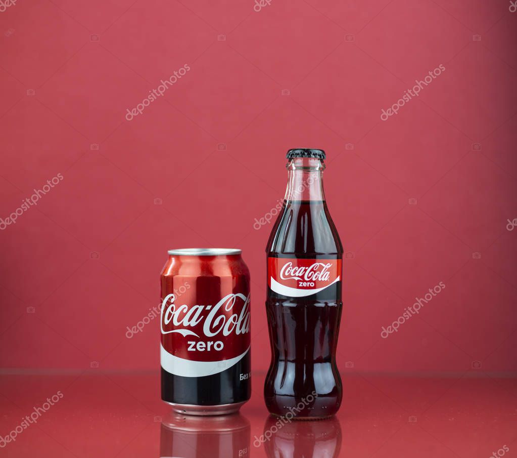 Coca-cola zero can and contour bottle on red background