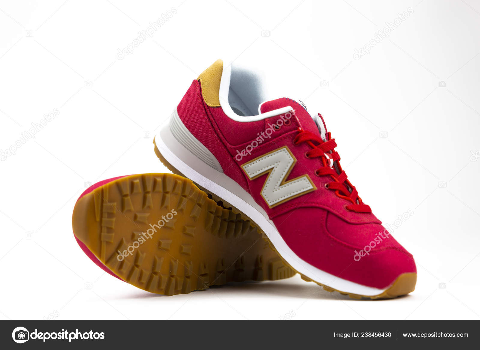 BOSTON, MA, USA, January 2019 - New Balance NB 574 athletic shoes on studio background. New Balance Athletics one of the worlds major sports footwear manufacturers. Illustrative editorial – Stock Editorial Photo © taborov #238456430
