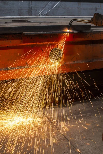 Industrial Worker at the factory welding closeup a lot of sparks — Stock Photo, Image