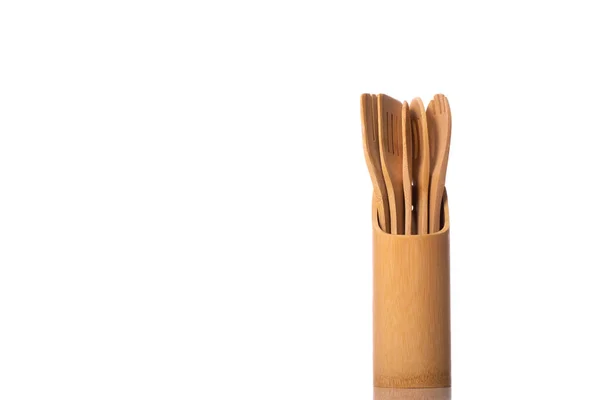 Wooden bamboo kitchen utensils. Five pieces in stand isolated on white backdrop — Stock Photo, Image