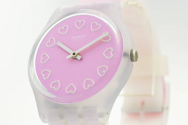 Geneve, Switzerland 07.10.2020 - Swatch pink quartz watch Love round clock — 스톡 사진