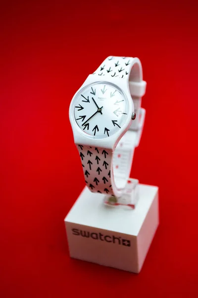 New York, NY, USA 07.10.2020 - Swatch childrens swiss made quartz watch on red — 스톡 사진