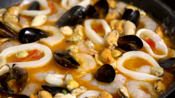 Close up paella is stewed in pan. Cooking vegetarian healthy dinner, recipe — Stock Video