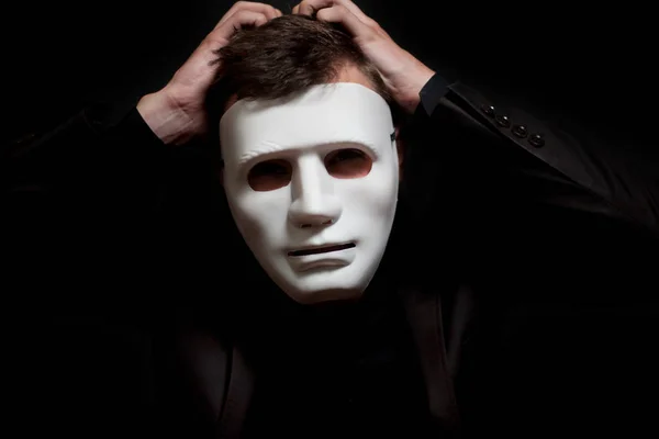 Close Van Een Man Een Wit Masker Houd Zijn Handen — Stockfoto