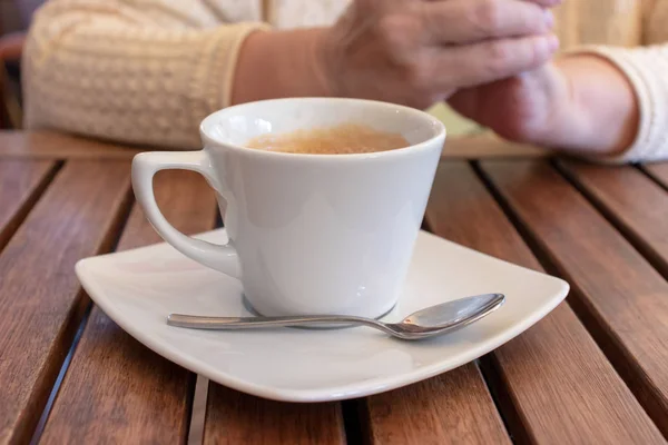 Cup Coffee Wooden Table Hands Elderly Woman — Stock Photo, Image