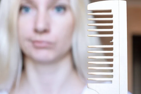 Blurred Blond Woman Broken Comb Her Hand — Stock Photo, Image