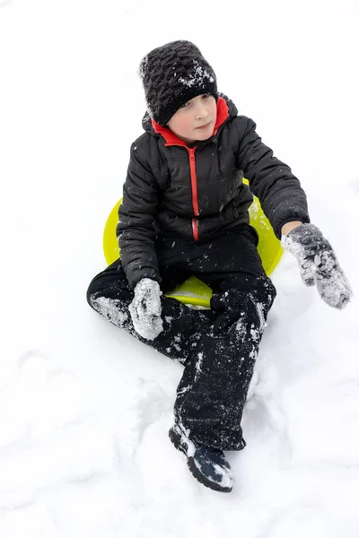 Boy Seven Years Old Sitting Green Plastic Saucer Sled Ready — Stock Photo, Image