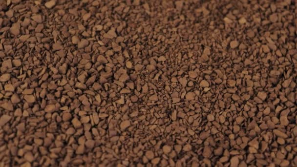 Granulated instant coffee rotating background, slow motion — Stock Video