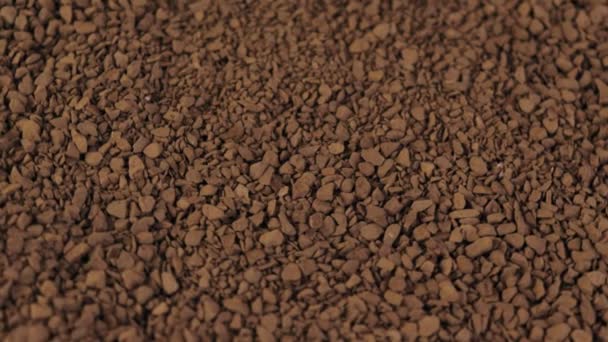 Granulated instant coffee rotating background, slow motion — Stock Video