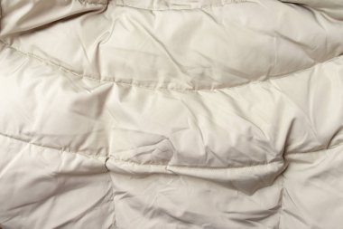 Buruşuk bej salladı kumaş doku arka plan katlanmış