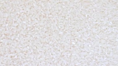 Taze çiğ organik risotto pirinç rotasyon arka plan