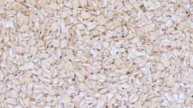 Ham yulaf gevreği doku, sağlıklı yulaf lapası rotasyon arka plan, kopya alanı