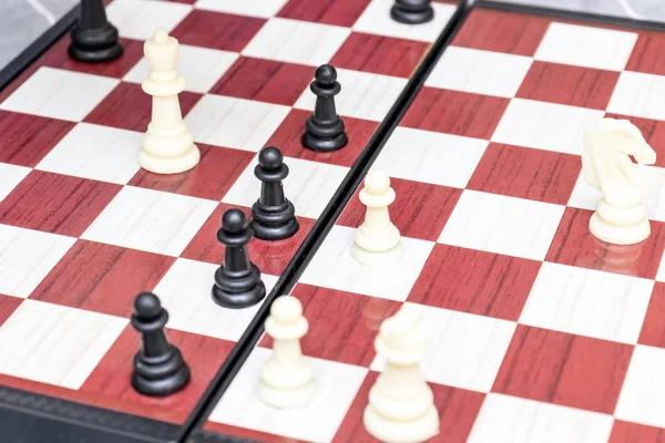 Chess board with figures on it close up, intellectual board games and hobby concept — Stock Photo, Image