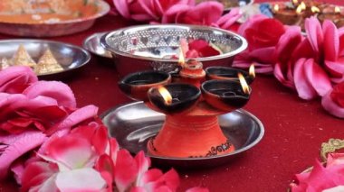 Traditional south indian ceramic oil lamp Nilavilakku on wedding ceremony, Nilavilakku is lighted before starting the rituals