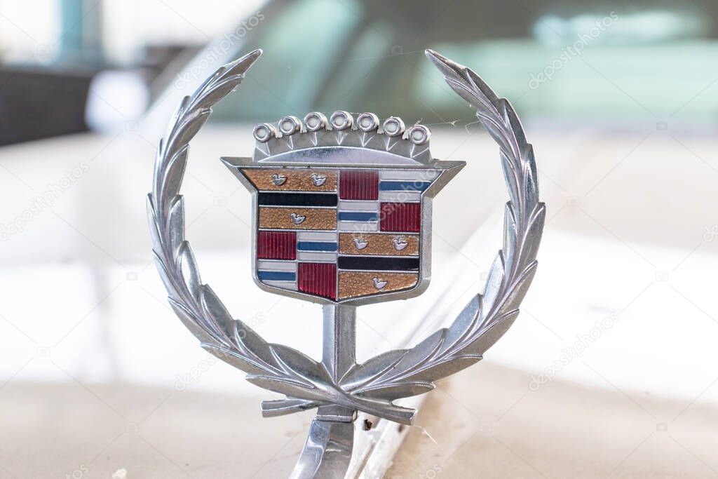 Mozhaisk, Russia - August 11, 2019: Cadillac nameplate on retro car in museum of vintage cars, a symbol of richness and luxury.
