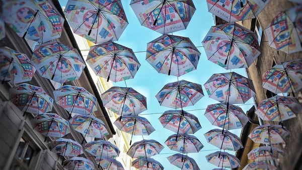 An umbrellas like a roof. Protection from sunlight and decoration in the bar.