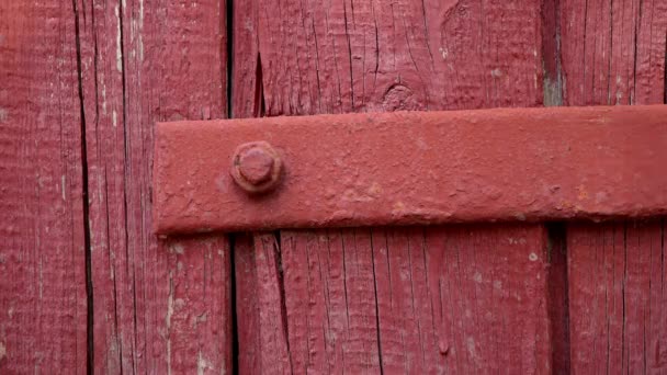 Superficie de madera pintada vieja roja para textura de fondo — Vídeo de stock