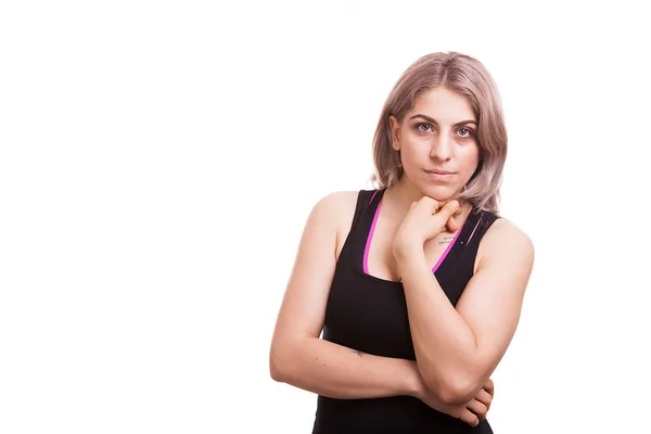 Mujer posando a la cámara en ropa deportiva — Foto de Stock