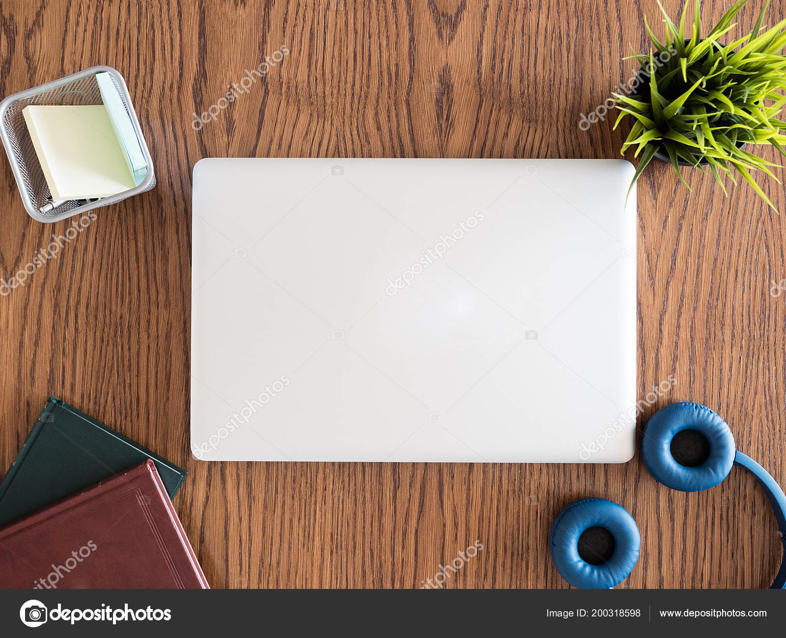 Closed Computer On A Businessman Desk Stock Photo