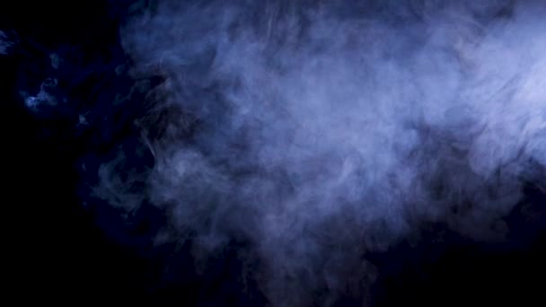 Partículas de humo sobre fondo negro — Vídeos de Stock