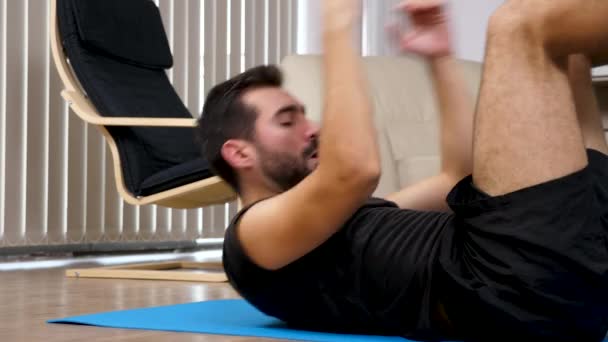 Close up of an athletic young man doing crunches — Stock Video