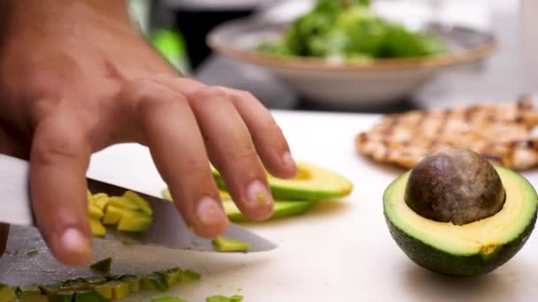 Cutting Avocado Pieces Close Footage — Stock Video