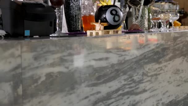 Bartender shaking a cocktail in the shakier — Stock Video