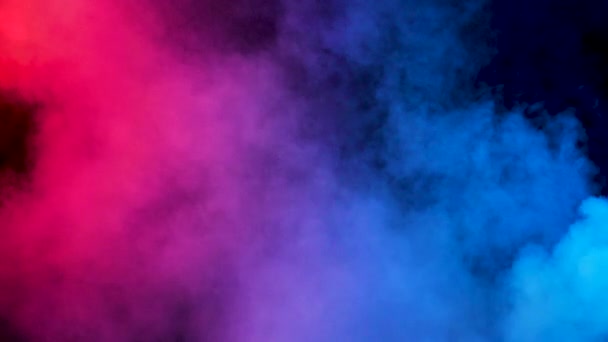 Abstract dispersing and moving clouds of colored smoke — Stock Video