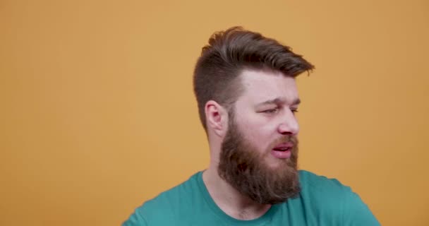 Bearded young man is bored and sad — Stock Video