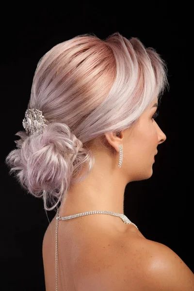 Close up portrait of stylish coiffure on beautiful blonde woman on studio background — Stock Photo, Image