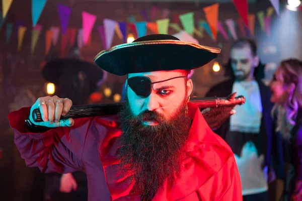 Portrait of angry pirate with one eye covered at halloween celebration — Stock Photo, Image