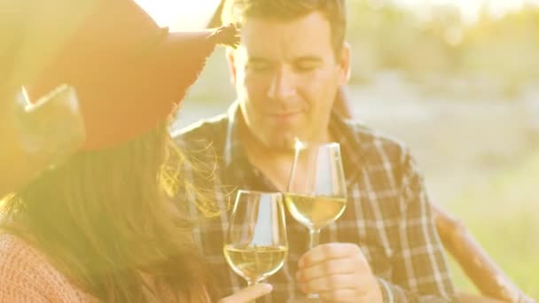 Close up shot of couple in sun flares having a tender moment — Stock Video