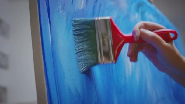 Lienzo de pintura con pincel — Vídeo de stock