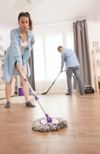 Wife doing housekeeping — Stock Photo, Image