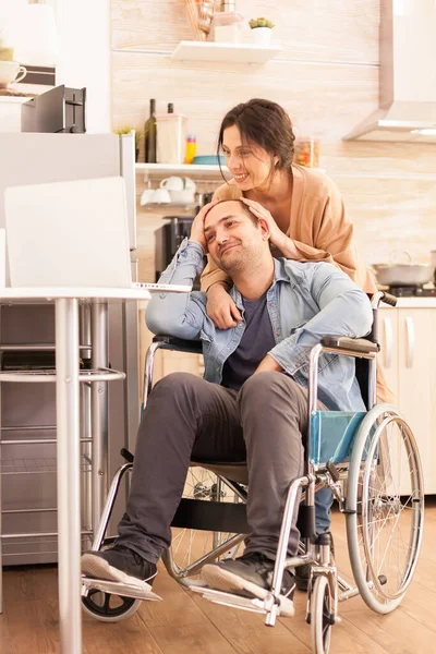 Cheerful disabled man in wheelchair