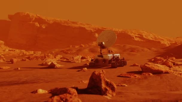 Mars 'ın kırmızı gezegen yüzeyinde küçük bir gezgin keşfe çıktı. — Stok video