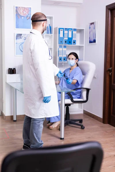 Giving radiography of invalid patient — Stock Photo, Image