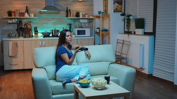 Lady watching Tv in living room — Stock Photo, Image