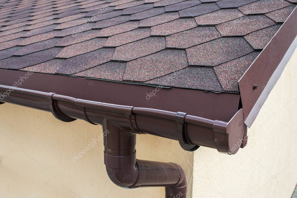 plastic drainage on the roof near the shingles
