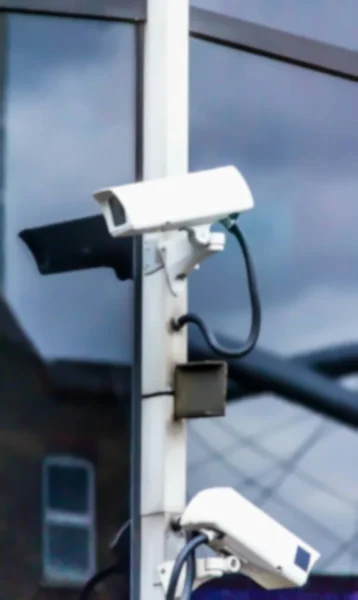 Blurred View Two Outdoor Cctv Security Camera Glass Wall Modern — Stock Photo, Image