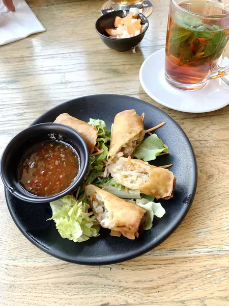 Egg roll. Patties rolls of dough stuffed with meat. Japanese or Chinese appetizer