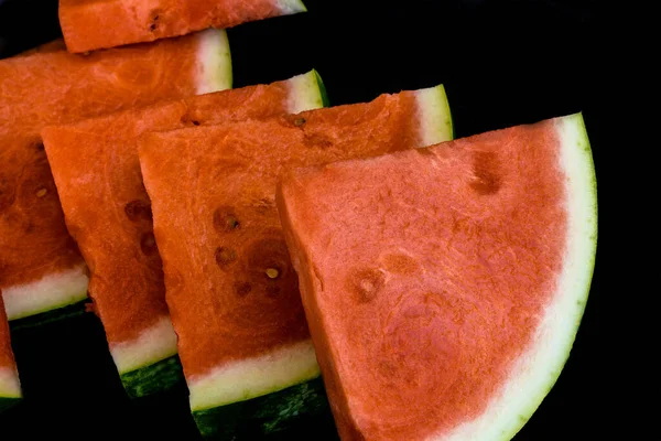 Slices Red Ripe Sweet Watermelon Black Background Closeup Selective Focus — Stock Photo, Image