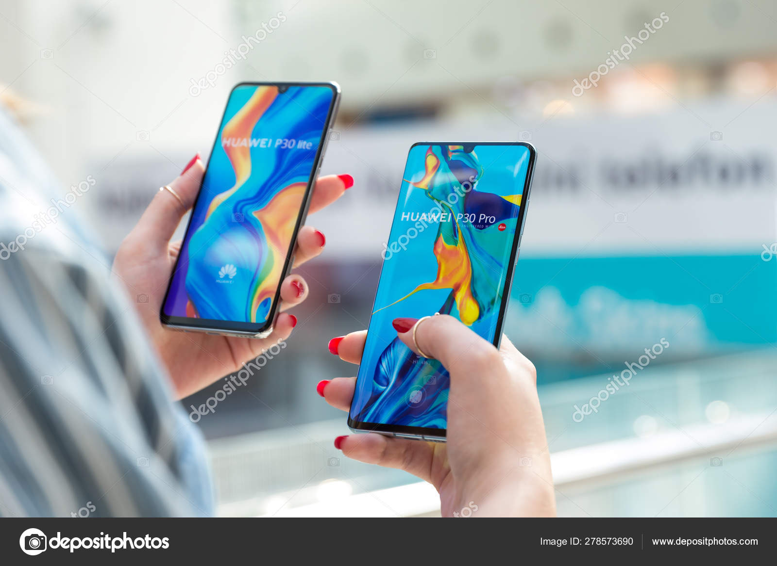 Download Two Huawei P30 Smartphones Displayed In Hands On Isolated Background Stock Editorial Photo C Nemanjazotovic 278573690