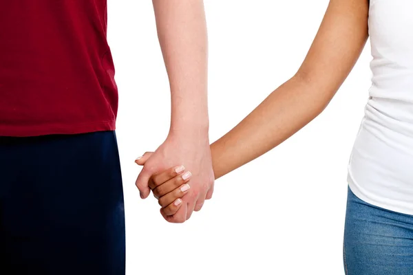 Mani in mano coppia di una razza mista su sfondo bianco . — Foto Stock