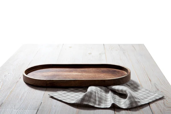 Wooden tray and napkin on white wooden table. Empty tray mock up for design. Top view. — Stock Photo, Image