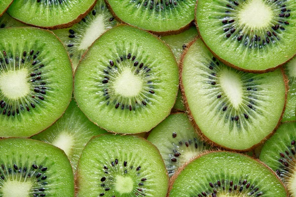 Kiwi fatias fundo — Fotografia de Stock